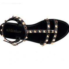 Olivia Miller Super Cute T Strap Studded Rubber Sandals Size 8 Brand New Black And Gold Summer Sandals With Spikes And Flat Heel, Flat Heel Sandals With Spikes For Summer, Trendy Black Ankle Strap Jelly Sandals, Flat Sandals With Spikes For The Beach, Spiked Open Toe Sandals For Beach, Casual Party Sandals With Spikes, Casual Spiked Sandals For Party, Black Ankle Strap Jelly Sandals For Summer, Summer Flat Heel Sandals With Spikes