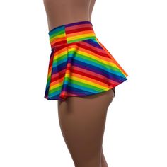 Made of stretchy rainbow stripe print spandex, this circle skater skirt swings and twirls with movement. Perfect for your pride parade outfit! The skirt length is 10" from top to bottom. Fitted Rainbow Print Bottoms For Summer, Fitted Multicolor Skirted Bottoms, Multicolor Summer Bottoms For Cheerleading, Multicolor Stretch Skirted Skort, Fitted Multicolor Bottoms For Pride, Fitted Fun Multicolor Shorts, Fitted Multicolor Skirted Skort, Striped Fitted Short Length Skort, Playful Fitted Mini Skirt Skort