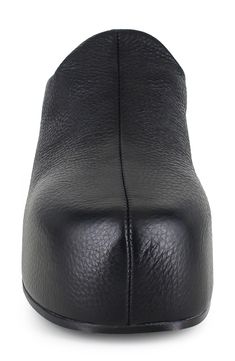 A center seam splits the streamlined silhouette of this contemporary-chic leather clog lofted on a chunky platform. 2 3/4" heel; 1 1/2" platform Water-resistant Leather upper and lining/rubber sole Made in Italy Modern Mules With Rubber Heel Cap And Round Toe, Modern Black Clogs With Sculpted Heel, Leather Clogs With Deep Heel Cup And Block Heel, Leather Clogs With Sculpted Heel And Almond Toe, Leather Almond Toe Clogs With Sculpted Heel, Leather Platform Boots With Closed Toe, Leather Clogs With Stacked Heel And Almond Toe, Modern Black Clogs With Rubber Heel Cap, Modern Leather Heels With Leather Footbed