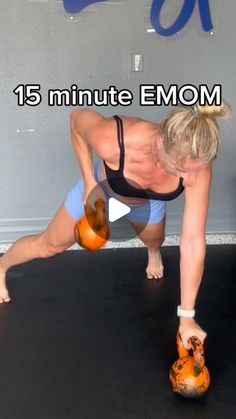 a woman is doing exercises with an orange ball in her hand and the words 15 minute emom above her head