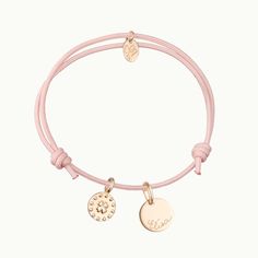 For a wish of luck and love, give our Personalized Clover Bracelet as a thoughtful keepsake to cherish. Personalize this bracelet with a special name or heartfelt word to create a keepsake full of meaning.&nbsp;18K Champagne Gold PlatedMini flat disc: 0.4 Diameter, 0.02 ThicknessClover Charm: 0.35Braid made of a durable, colorfast polyesterFully adjustable sliding knot fasteningHand-engraved in our Paris workshopSent with love in a complimentary gift boxAny slight variations in lettering depth, spacing and alignment from the examples shown are part of the aesthetic and originality of the piece Crystal Dice, Sliding Knot Bracelet, Clover Bracelet, Clover Charm, Knot Bracelet, Grandmother Gifts, Engraved Bracelet, Crystal Stars, Sliding Knot