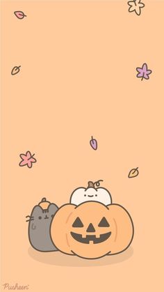 two cats sitting next to each other in front of a pumpkin with a face on it