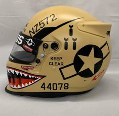 a helmet with an image of a shark on it