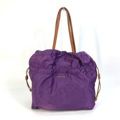 Name: Prada Logo Shoulder Bag Purse Tote Bag Shape: Tote Bag Model No.: Bn1757 Color: Purple Material: Nylon / Leather Approx Size: W14.2h15.6d3.7inch / W36cmh39.5cmd9.5cm The Base Is Used To Measure The Width. Listed Hand Measurements May Have A 1-2cm Difference. Gender: Women's Spec: [Inside] Zipper Pocket X 1 Additional Items: Authenticity Card , Item Rank: Used A Rank Condition Details: Outside:Minor Scratches,Light Stains Handle - Strap:Minor Scratches,Light Stains,Scrapes Inside:Minor Scratches,Light Stains Metal Fittings Part:Minor Scratches,Dullness Product Introduction: Shoulder Bag With A Cute Big Logo. Purple Prada Handbag, Prada Tote Bag, Purple Logo, Coach Tote, Bag Model, Bags Logo, Purple Bags, Carry All Bag, Shoulder Tote Bag