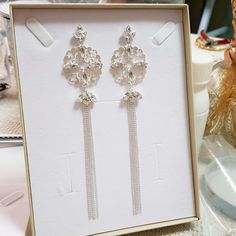 "Fancy Long evening crystal earrings, formal fringe earrings, made with marchioness swarovski crystal setting and and dainty tiny balls chain that capture the light for that extra shine! Are you ready to be dazzling? Item details: * A pair of extra long earrings * Length: 5.75\" inch (14.6 cm) *Shorter option is optional - just write me in a message to seller the desired length * Width: 1.15\" inch (2.9 cm) * Item will arrive in a beautiful gift box with my brand logo, ready for gift giving, eve Wedding Crystal Tassel Earrings, Crystal Tassel Earrings For Wedding, Glamorous Crystal Tassel Earrings For Wedding, Glamorous Rhinestone Tassel Earrings For Wedding, Elegant Crystal Chandelier Earrings For Party, Wedding Tassel Drop Earrings With Rhinestones, Party Crystal Chandelier Earrings With Elegant Design, Glamorous Silver Tassel Earrings For Wedding, Silver Rhinestone Tassel Earrings For Wedding