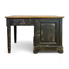 an old wooden desk with two drawers on one side and a drawer on the other