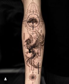 a man's arm with an eagle and geometric shapes on the side of his leg