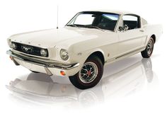 an old white mustang car on a white background