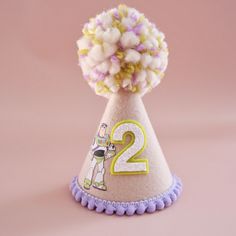 To infinity & beyond Say hello to our new Buzz themed Party Hat! Premium quality, handmade and 100% original design from Our Little Deer DETAILS ♕  1 x 100% Merino Wool Felt Party Hat. Finished with feature buzz, mini pom trim, number of choice and wool Pom.  (any number available, not just for 1st Birthdays. Please select number) Elastic comes attached to wear around back of head. ♕ Size approx - Height 14.5cm, Width 9cm  Express post is also available in the shipping options. COLOURS Boho Meri Buzz Birthday, Felt Party Hat, Hat Birthday Party, Mini Pom, Hat Cake, Hat Party, Birthday Party Hats, Toddler Birthday, 1st Birthdays