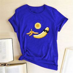 Sunbathing Banana Printed Funny T-shirts Women Summer Tshirt Woman Funny Cute Tops Graphic Teefor Ladies Ropa Mujer Verano Fun Crew Neck Shirt For Beach Season, Blue Crew Neck Tops For Beach Season, Summer Beach T-shirt With Cartoon Print, Summer Cartoon Print T-shirt For The Beach, Casual Cartoon Print Tops For Vacation, Casual Cartoon Print T-shirt For Summer, Cotton Vacation T-shirt With Cartoon Print, Summer Cartoon Print Short Sleeve T-shirt, Summer Graphic Tee With Cartoon Print