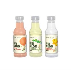 three bottles of juice with different flavors