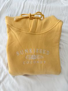 ☀ QUALITY: At Sunkissedcoconut our brand believes in using the best materials to create our designs. We use luxury paint, ink, fabric & thread to make our products. Our designs are meant to last. Once you wear sunkissedcoconut hoodies and tees you won't want to shop anywhere else! ☀ MODEL DETAILS: Please size up on Embroidered Clothes Ideas, Aesthetic Jumpers, Outfit Ideas Shirt, Shirt Outfit Ideas, Hoodie Ideas, Wallet Minimalist, Shirt Design Ideas, Yellow Hoodie, Mens Wallet