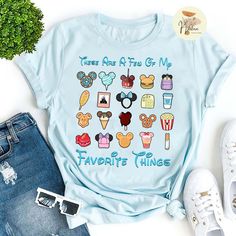 Buy Disney Snacks Shirt, There Are A Few Of My Favorite Things, Disney Life, Disney Snacking Shirt 50% OFF is designed & sold by Mali. SKU 40613445 listed on 03 13, 2023. Most ship worldwide within 24 hours. Delivery to the United States. Disneyland Christmas Outfit, Disney Sidekicks, Disney Eras, Vacation 2023, Disney Adult, Disneyland Christmas, Universal Shirts, Disney Snacks, Disney Life