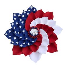 a red, white and blue flower with an american flag pinwheel on it's center