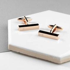 Sometimes less is so much more. These beautifully crafted, premium quality personalised silver or rose gold bar cufflinks are stylish and contemporary and the perfect accessory for any dapper man. It'll make an amazing birthday, Valentine's, Father's Day or Christmas gift for him. Available in both silver or rose gold plated varieties. Both cufflinks in this set can be engraved by our expert engraving team with your choice of personalisation, crafting a beautiful pair of clothing accessories that'll go perfect with any shirt, on any occasion. Cufflink 1: Up to 12 characters Cufflink 2: Up to 12 characters Dimensions: 2.5cm x 0.5cm x 2.4cm Materials: Silver/Rose Gold Plated Personalized Bridal Gifts, Rose Gold Cufflinks, Dapper Man, Silver Cufflinks Men, Monogrammed Cufflinks, Wedding Roles, Rose Gold Bar, Wedding Thank You Gifts, Groom Cufflinks