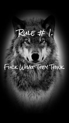 a wolf with the words true 1 and it's face in front of him