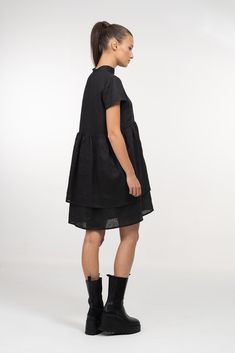 Discover the luxury feeling of wearing natural fabrics. The black linen summer dress is feminine piece with timeless design. Made of 100% pure linen, which becomes softer the more you wear it, the little black dress is perfect for hot weather and highly absorbable. The black midi summer dress features modest design with A-line silhouette, short sleeves, front zipper closure and double layer flounce.  Suitable for numerous occasions, the black linen summer dress will become your favourite wardrob Black Linen Summer Dress For Daywear, Black Linen Dress For Beach In Spring, Black Linen Dress For Spring Beach Outing, Chic Black Linen Beach Dress, Chic Black Linen Dress For The Beach, Casual Black Linen Midi Dress, Chic Black Linen Dress, Black Linen Short Sleeve Dress For Spring, Knee-length Linen Mini Dress For Daywear