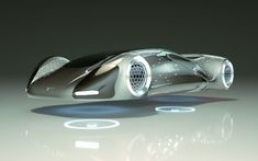 a futuristic car is shown on a reflective surface