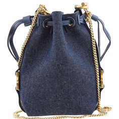 Chloe Ladies Bucket Bag. SKU: CHC23AP844K59. Closure Type: Drawstring. Color: Denim. Size: H 7.W 11 x H 18 cm. Chole Micro Marcie Bucket Bag. The Micro Marcie Bucket Bag features a chain shoulder strap and a leather top with a drawstring fastening. It showcases a contrasting branded press-stamped logo on the front, a grained leather design, and elegant gold-tone hardware. Made in Spain Versace Watch, Buy Watches, Denim Shoes, Crossbody Messenger Bag, Simple Bags, Mini Handbags, Leather Design, Handbag Backpack, Leather Top