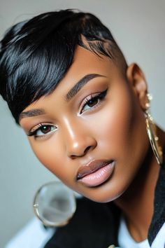 Explore 25 pixie cuts for black women that are anything but ordinary! Discover the latest trends in pixie hairstyles for black women, including textured pixie cuts, edgy undercut pixies, and bold asymmetrical looks. Whether you're looking for a natural pixie style or a vibrant color transformation, these short haircuts are sure to inspire your next hair makeover. Sleek Pixie Haircut Black Women, Pixie Hairstyles For Black Women, Pixie Cuts For Black Women, Edgy Undercut, Shaved Pixie Cut, Textured Pixie, Shaved Hairstyles, 2024 Hairstyles, Black Hair Cuts