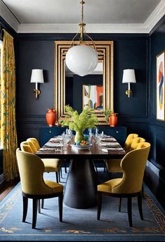 a dining room with blue walls and yellow chairs