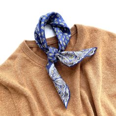 Elevate your style with our Classic Paisley Silk Neckerchief in Sky Blue and Rich Blue. Crafted from 100% silk twill, this luxurious accessory features hand-rolled edges and a timeless paisley pattern for a refined finish. Versatile and elegant, it's perfect for both formal events and everyday wear, making it an ideal gift for the stylish gentleman. Benefits of Wearing Silk Hypoallergenic Properties: Silk's natural hypoallergenic nature suits sensitive skin, reducing reactions for comfort. Tempe Small Silk Scarf, Silk Scarf Hair, Silk Bandana, Better Style, Silk Hair, Rolled Hem, Silk Twill, Paisley Pattern, Silk Scarves