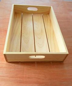 a wooden tray sitting on top of a table