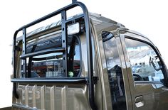 an open door on the side of a silver truck