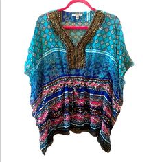 Peppe Peluso Women’s Boho Sheer Embellished Tunic Blouse Nwot Nwot Never Worn! Brand: Peppe Peluso Size: Small Geo Tribal Aztec Printed Embellished Tunic Blouse Top. Deep V-Notch Neckline Accentuated With Gorgeous Golden Metallic Bronze Embellishment. Waistline Drawstring Ties To Accentuate Figure. Measurements: 27” Length From Top Shoulder To Bottom Hem 21” Approximately Armpit To Armpit 100% Polyester Multicolor Beaded Tops For Festival, Bohemian Embellished Summer Blouse, Summer Bohemian Embellished Blouse, Bohemian Embellished V-neck Blouse, Bohemian V-neck Sequin Tops, Multicolor Beaded Bohemian Tops, Embellished Summer Beach Blouse, Summer Beach Blouse Embellished, Casual Embellished Summer Blouse