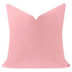 a pink pillow on a white background