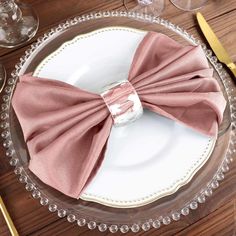 a plate with a pink bow on it