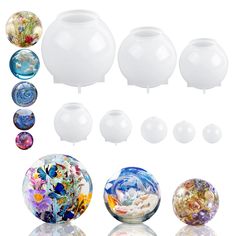 several glass vases with different designs and colors on the top one is filled with water