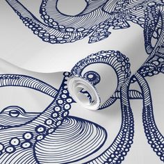 an octopus wallpaper in blue and white with intricate designs on the back side of it