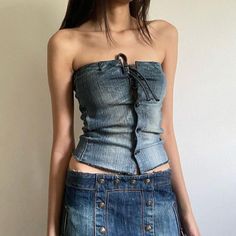 The Lace Up Denim Corset is a fresh addition to this season's fashion trends. offering a modern interpretation of the Y2K aesthetic. With its laced-up design and denim material. it brings a unique blend of edginess and femininity to your wardrobeSize:/strong> S: Bust: 76cm/ 29.9 in. Length: 40cm/ 15.7 inspan> M: Bust: 80cm/ 31.5 in. Length: 41cm/ 16.1 inspan> L: Bust: 84cm/ 33.1 in. Length: 42cm/ 16.5 inMaterial: Denim Boogzel Apparel, E Girl Clothes, Lace Denim Shorts, Denim Corset Top, Artsy Outfit, Denim Corset, Urban Style, Summer Fashion Outfits, Y2k Aesthetic