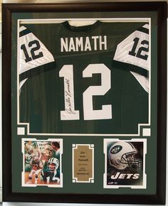 an autographed new york jets jersey is displayed in a shadow box on the wall