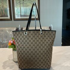 Authentic Gucci Tote Bag. It Has Scuffs On The Body And Rubs On Corners But Other Than That There’s No Other Flaws To Mention. The Straps Are Good And Inside Is Very Clean Without Foul Odor. Priced Considering All The Flaws So Please Manage Your Expectations And Review All Pictures Closely Before Purchasing. No Return And Price Is Firm!!! Gucci Leather Lined Tote Bag, Gold Gucci Tote Bag, Gucci Tote Bag With Leather Trim, Gucci Tote Bag With Branded Hardware, High-end Gucci Tote Bag, Gucci Bags, Gucci Tote Bag, Womens Tote Bags, Gucci