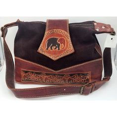 This Is A Beautiful Leather Purse/Shoulder Bag/Handbag With An Adjustable Strap. The Stitching And Details Are Adorable. Really Cute Boho/Hippie Style. Diesel Brown Leather Measurements Are Approximately 13.5" X 3.75" X 9" Tall. In The Photos, The Strap Is 33" And Can Extend One More Inch. One Zippered Inside Pocket We Do Our Very Best To Disclose Everything We See With Photos & Descriptions. Colors May Vary A Shade Or Two Due To The Lighting. New With Tags Brown Leather Hobo Shoulder Bag, Brown Leather Saddle Shoulder Bag, Brown Satchel Bag With Leather Lining, Brown Top Handle Bag With Leather Lining, Brown Leather-lined Satchel Bag, Brown Leather Lined Hobo Shoulder Bag, Hand Tooled Crossbody Travel Bag, Brown Satchel With Leather Backing And Top Handle, Brown Leather Shoulder Bag With Adjustable Strap