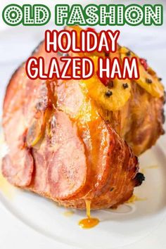 an old fashion holiday glazed ham on a white plate with text overlay that reads old fashion holiday glazed ham