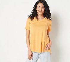 This swingy short-sleeve top is your new go-to for easy-going days spent strolling through town. Pair it with leggings, jeans, or even sweats for a casually chic look. From LOGO by Lori Goldstein®. Casual Stretch V-neck Top With Short Sleeves, Solid Color Short Sleeve V-neck Top For Spring, Spring V-neck Top With Short Sleeves, Casual V-neck Top With Short Sleeves And Stretch, Solid Color Relaxed Fit Short Sleeve V-neck Top, Relaxed Fit Solid Color V-neck Short Sleeve Top, Relaxed Fit Short Sleeve V-neck Top For Summer, Solid Color Relaxed Fit V-neck Short Sleeve Top, Solid Color V-neck Short Sleeve Top With Relaxed Fit