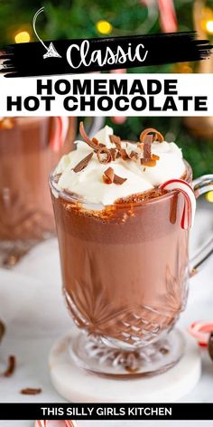 two glasses filled with hot chocolate and whipped cream