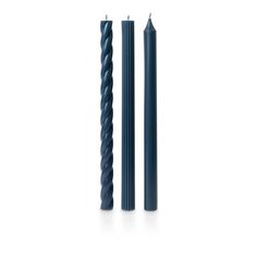 an image of two black candles on a white background