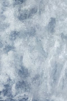 an abstract painting with white and blue colors