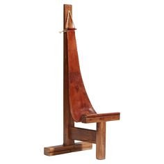 a wooden chair with a leather seat on it's back legs and an arm rest