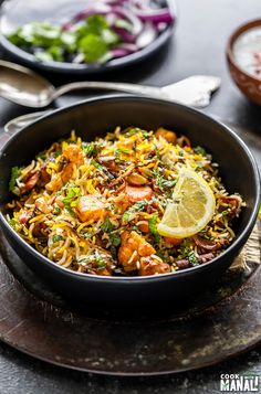 a close up of a bowl of food on a table