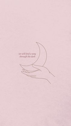 a pink background with a hand holding a half moon