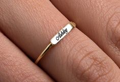 This Simple Name Ring is 14k Solid GOLD ( not filled or plated) You can customize this name ring with the name/word/date/mantra of your choice. Gold Name Ring is the best jewelry you could ever find. This will be the best gift for you and your loved one. All our gold/silver rings are suitable for Nameplate Engraved Ring For Gift, Customizable Nameplate Rings As Gifts, Customizable Nameplate Rings For Gifts, Gold Nameplate Engraved Ring As Gift, Custom Gold Engraved Personalized Ring, Customized Gold Engraved Ring As Gift, Customized Gold Engraved Ring For Gift, Custom Gold Engraved Ring For Gift, Custom Engraved Gold Ring For Gift