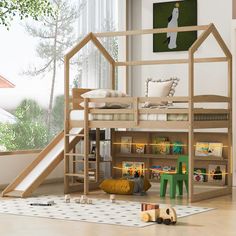 a child's bedroom with a bunk bed and slide