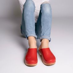 Slip-on Clogs With Leather Sole For Spring, Comfortable Red Summer Clogs, Casual Clogs With Wooden Heel, Spring Leather Footbed Slip-on Clogs, Casual Mules With Wooden Heel And Round Toe, Summer Slip-on Clogs With Leather Sole, Casual Closed Toe Clogs With Rubber Sole, Casual Spring Clogs With Leather Sole, Casual Leather Sole Clogs For Spring