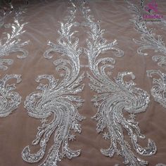 Price: The price is for 1 yard. if you buy more than 1 yard ,it won't be cut. will come in one piece the longest is 20 yards. Material: polyester,sequins,beads Fixed Wide : 100cm or 36 inches. color:silver Want to see other colors and more similar Beading lace fabrics come to: https://www.etsy.com/shop/Randyfabrics?ref=hdr_shop_menu&section_id=14192305 Shipping: Choose the shipping way you need, if you want package shipped by express,please note the phone number on order. Use for Dress,cloth Elegant Silver Embroidered Fabric For Wedding, Elegant Silver Embroidered Fabric With Lace Work, Elegant Silver Lace With Sequins, Elegant Silver Lace With Intricate Embroidery, Elegant Silver Lace Embroidered Fabric, Elegant Silver Embroidered Lace Fabric, Silver Lace Tulle Fabric For Wedding, Elegant Silver Lace With Lace Work, Elegant Silver Lace Tulle Fabric