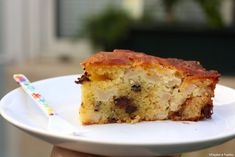 a piece of cake sitting on top of a white plate